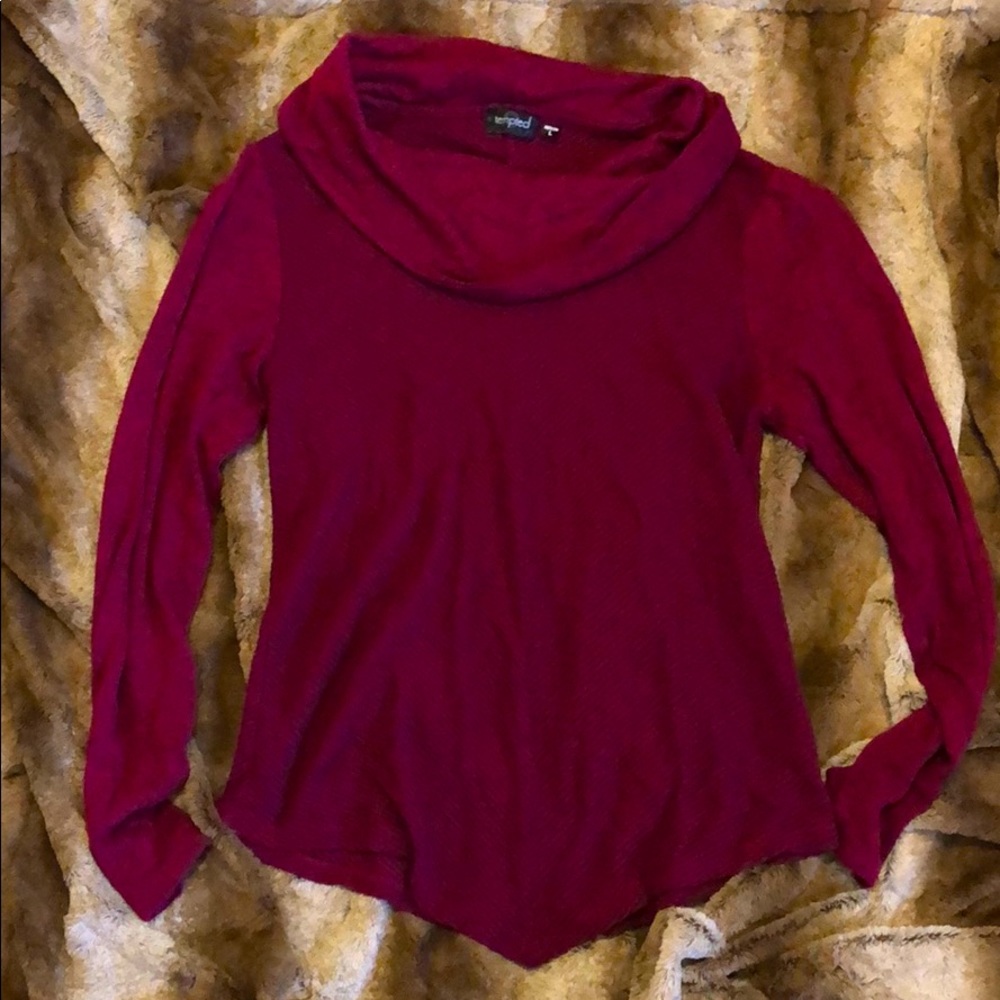 Cowl neck top.